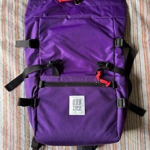 Topo Designs Purple Roll-Top Backpack with Black Straps and Red Zipper Pulls